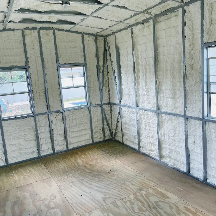 Closed-cell spray foam insulation applied to wall cavities in a residential project in Wood-Ridge